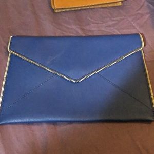 Envelope clutch with zipper detail, minor smudges
